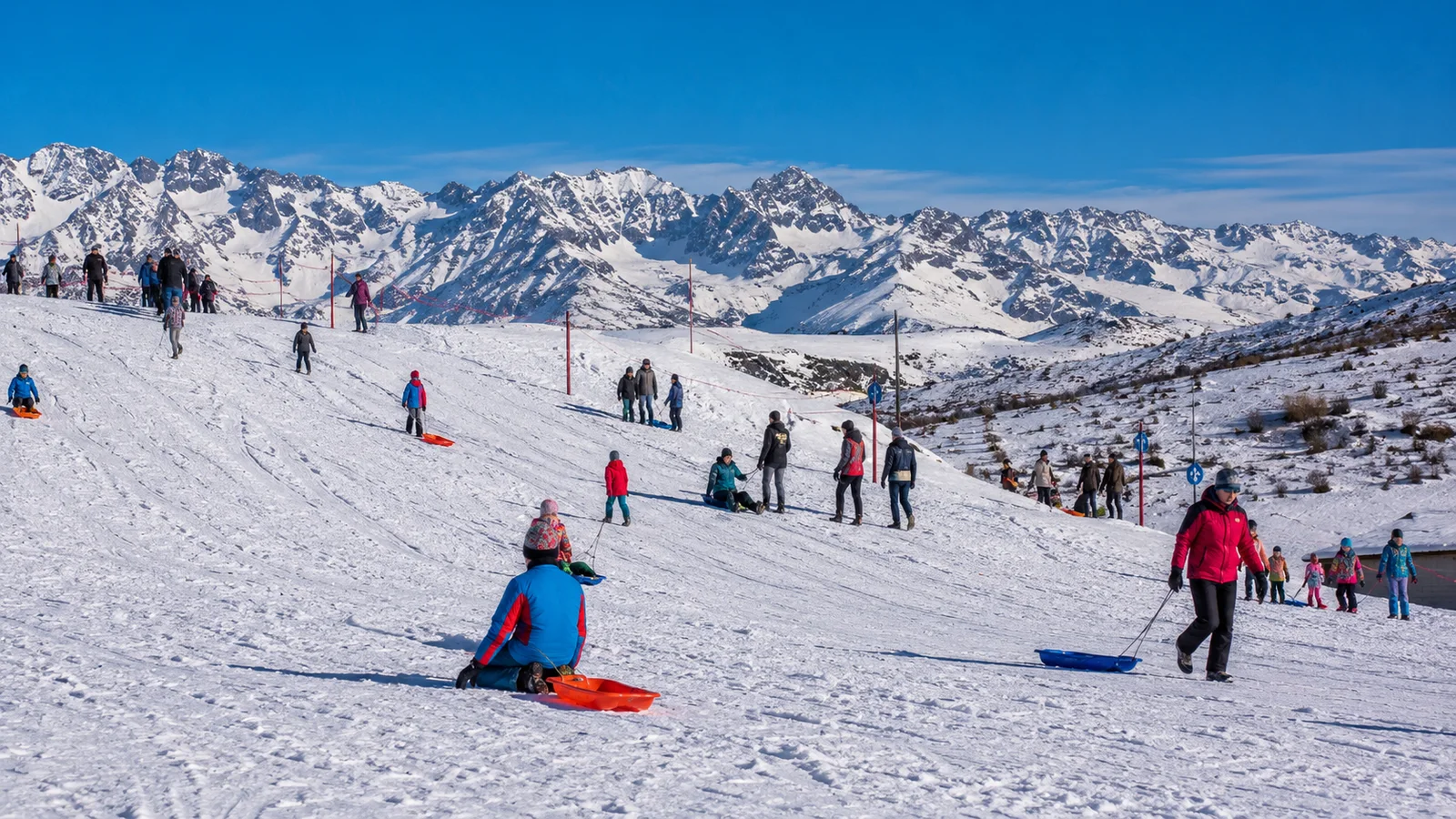 Principiantes en la escuela de esquí y snowboard de Los Puquios